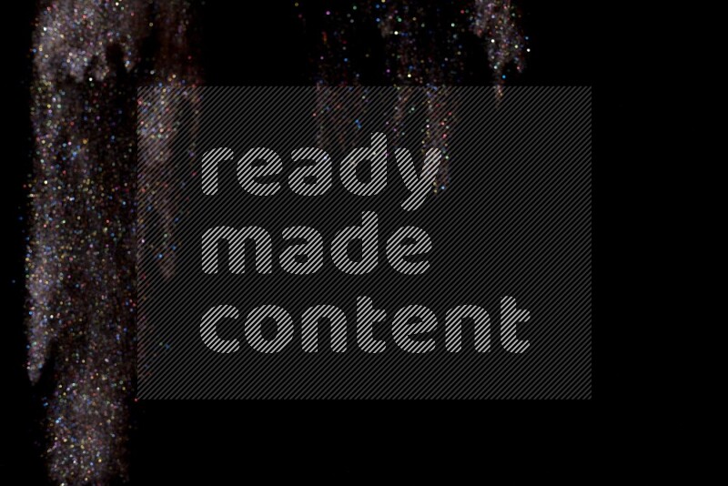 Multicolored glitter powder isolated on black background