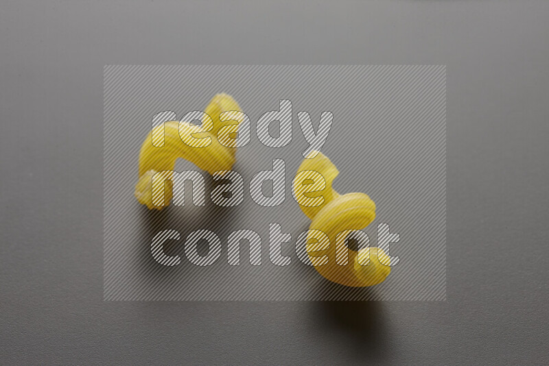 Twist pasta on grey background