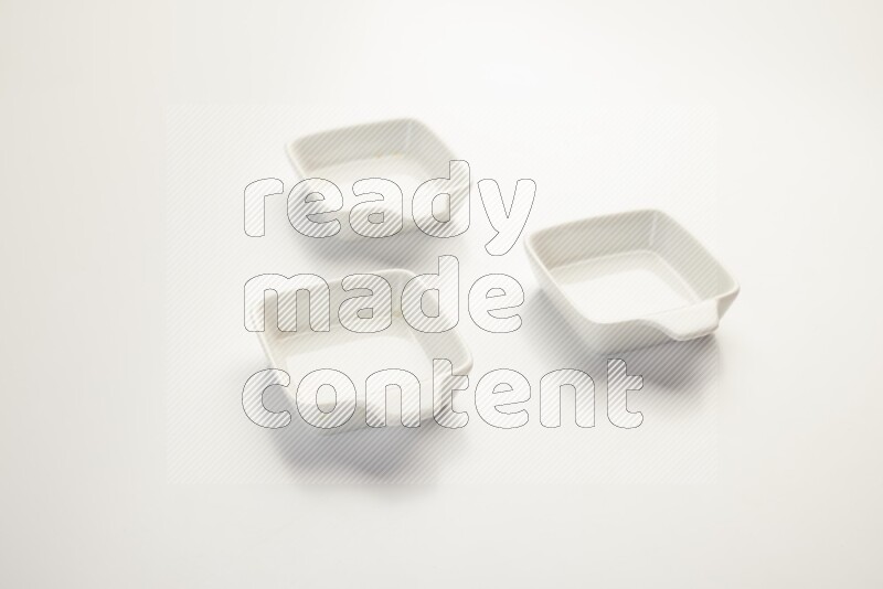 white ceramic square sauce dish on white countertop