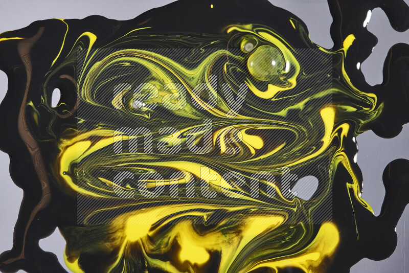 Abstract colorful background with mixed of yellow and black paint colors