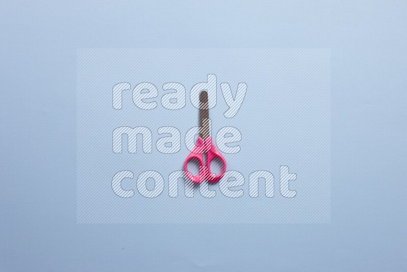 Different school supplies on blue background