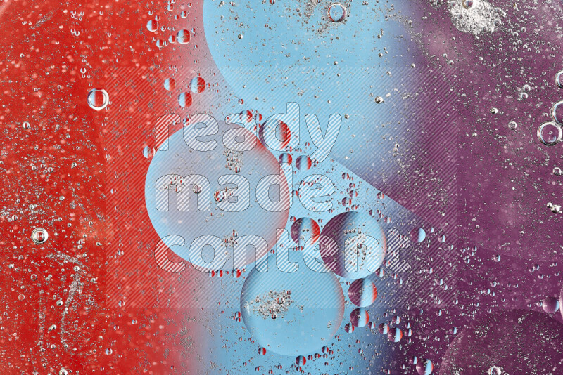 Close-ups of abstract oil bubbles on water surface in shades of blue, red and purple