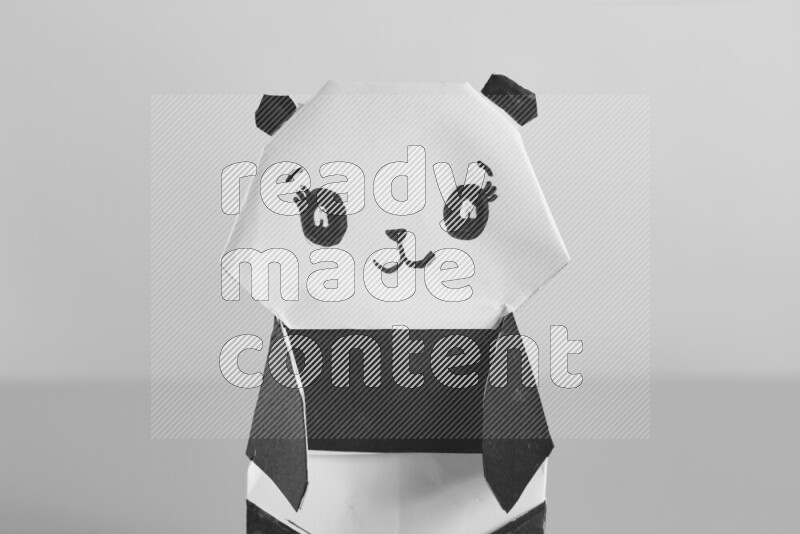 Origami animals on grey background