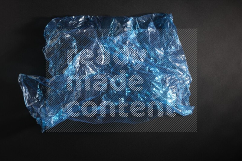 Colored plastic textures on black background