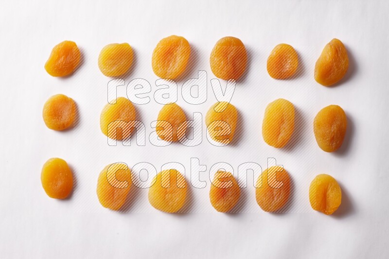 Dried apricots on white background