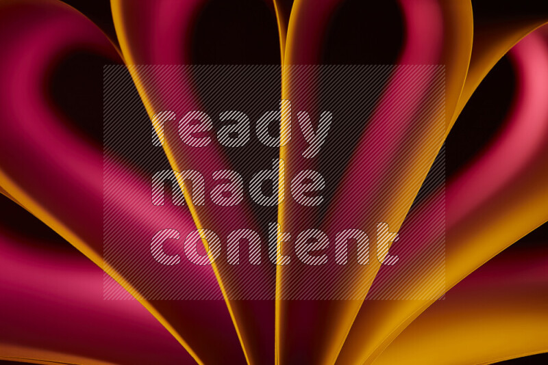 An abstract art piece displaying smooth curves in yellow and red gradients created by colored light