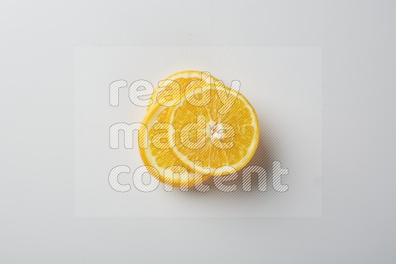 Three orange slices on a white background