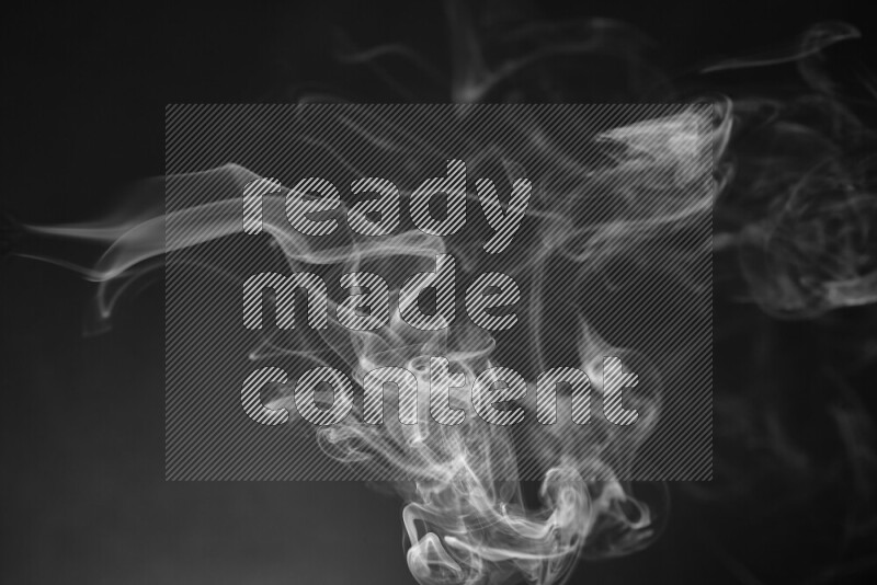 Motion of wavy smoke isolated on dark background