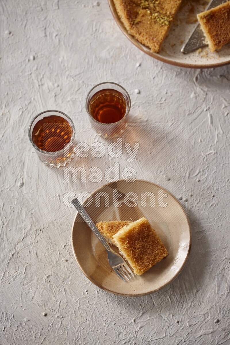 Konafa with tea in a light setup