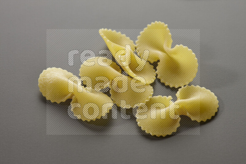 Fiocchi pasta on grey background