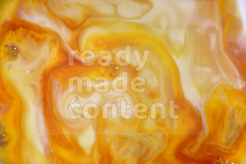 A close-up of abstract different swirling patterns in orange