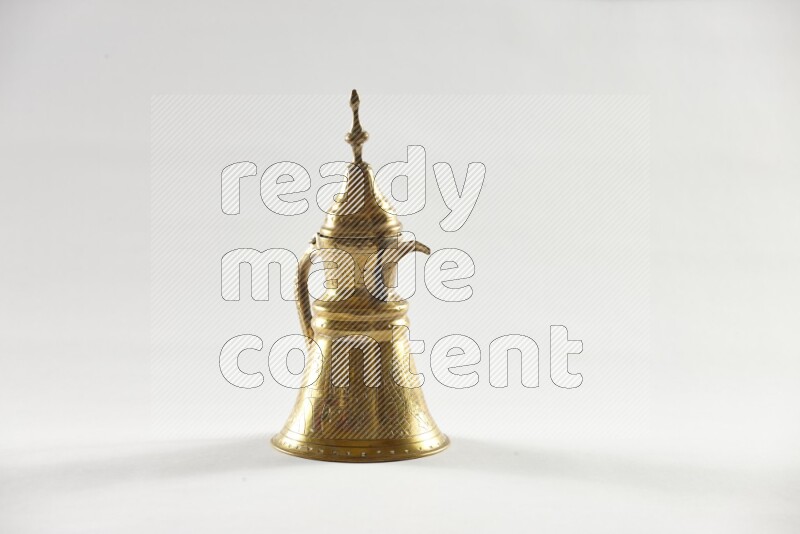 A metal turkish pot for coffee on white background
