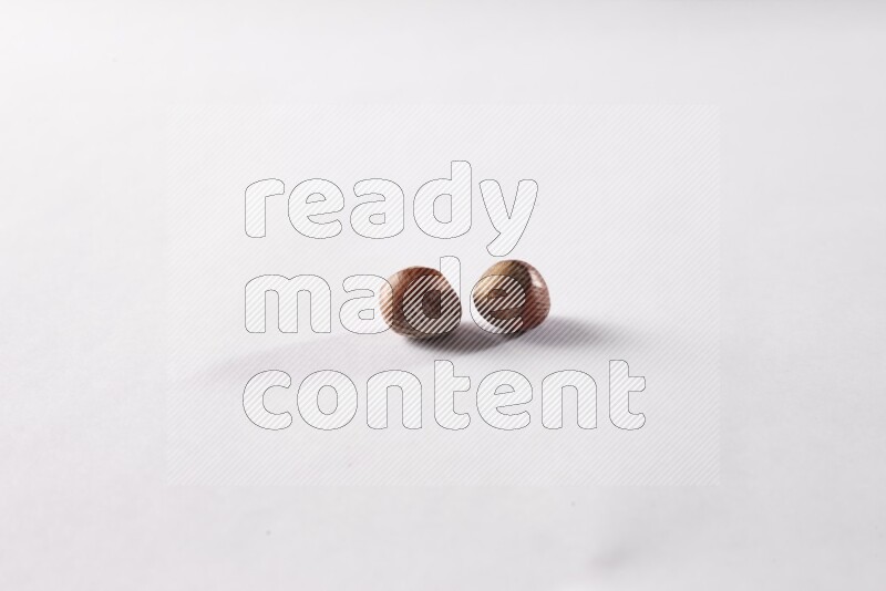 Hazelnuts on white background