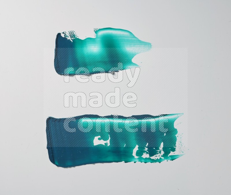 Turquoise painting knife strokes on white background