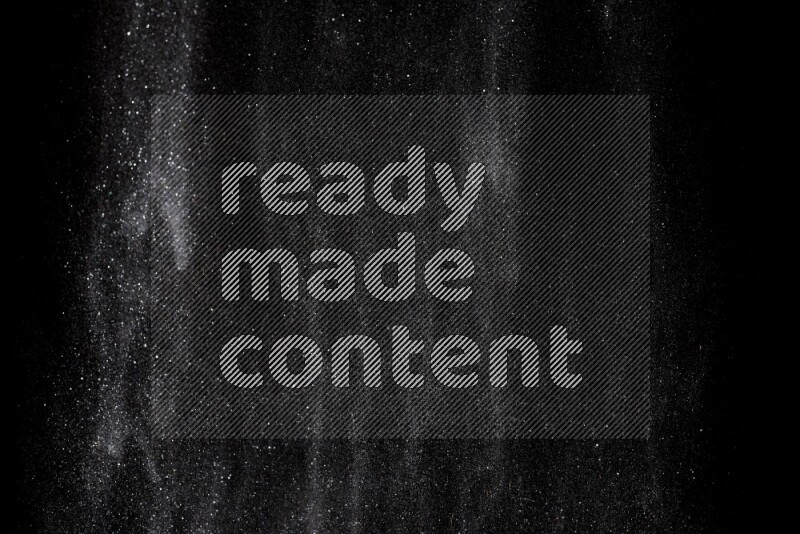 Silver glitter powder isolated on black background