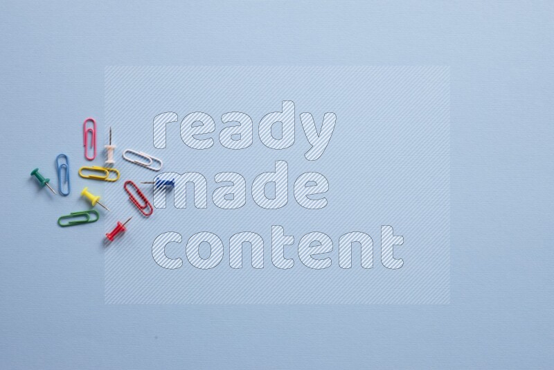 Different school supplies on blue background