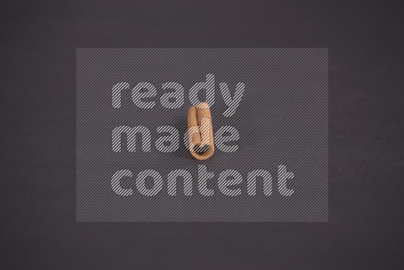 Cinnamon stick on black background