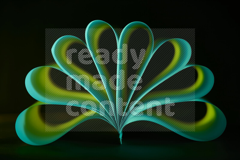 An abstract art piece displaying smooth curves in green gradients created by colored light