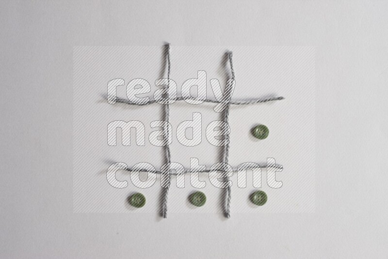 Green buttons placed on grey background