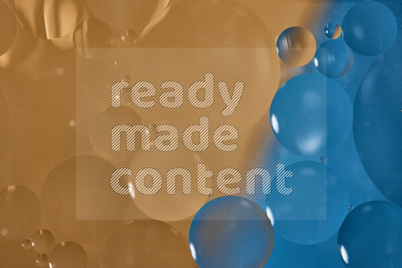 Close-ups of abstract oil bubbles on water surface in shades of blue and orange