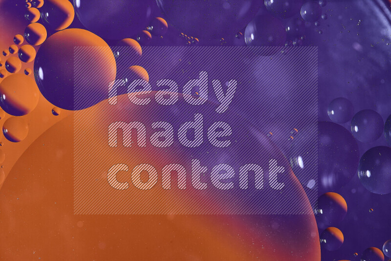 Close-ups of abstract oil bubbles on water surface in shades of orange and purple