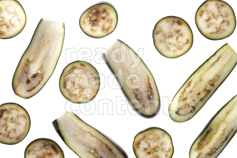 Eggplant slices on illuminated white background