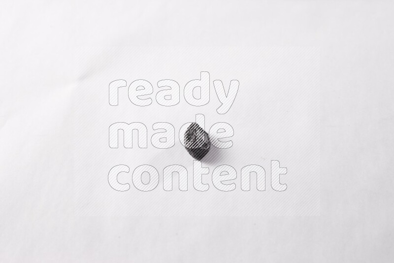 Dried plums on white background