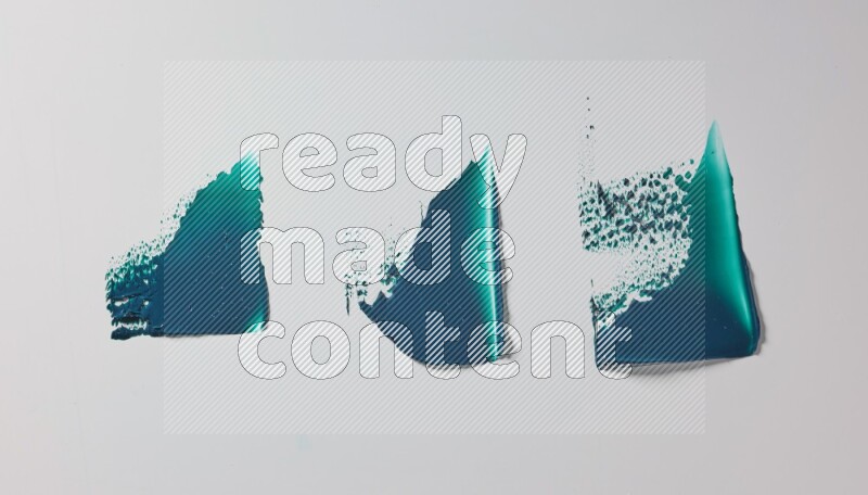 Turquoise painting knife strokes in on white background