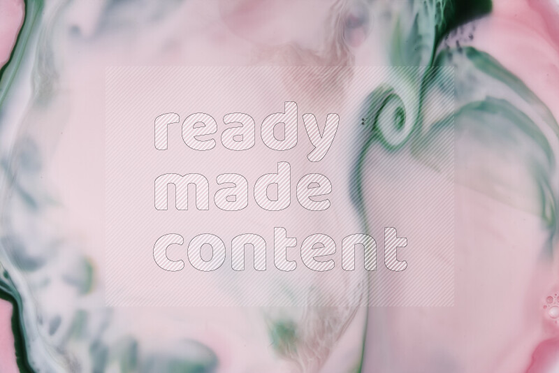 صورة مقربة لأنماط دوامية مجردة باللون الأحمر والأخضر