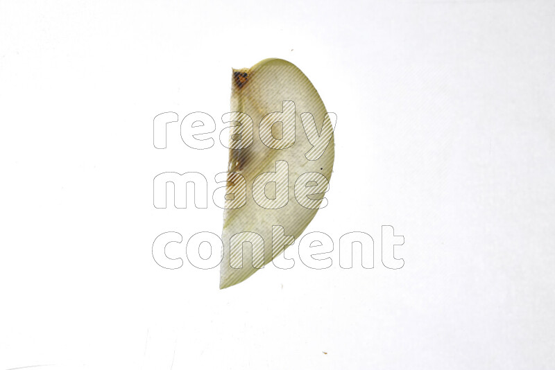 Pear slices on illuminated white background