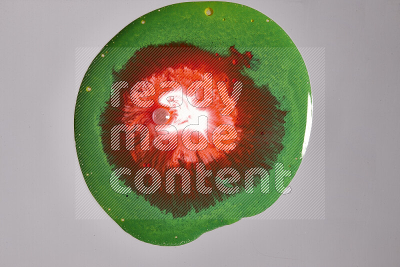 Close-ups of assorted colors blending on a grey background