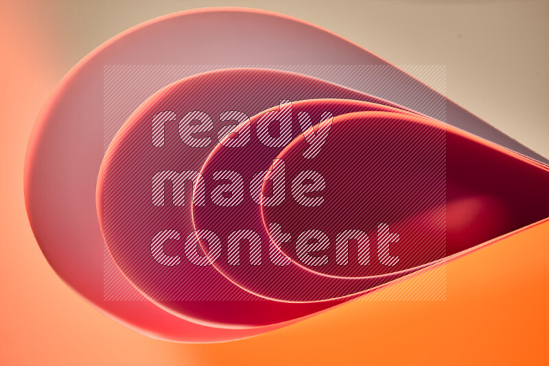 An abstract art of paper folded into smooth curves in red gradients