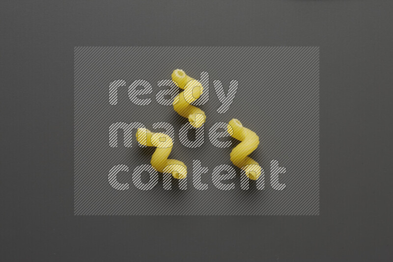 Twist pasta on grey background