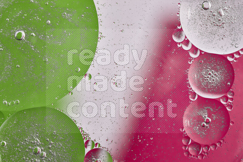 Close-ups of abstract oil bubbles on water surface in shades of pink, green and white
