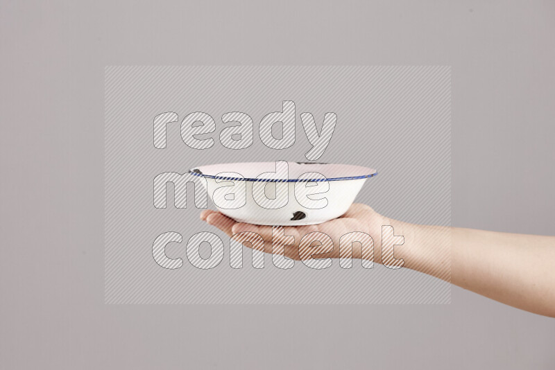 Woman hands holding different metal essentials in different positions