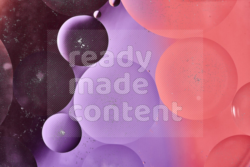 Close-ups of abstract oil bubbles on water surface in shades of orange and purple