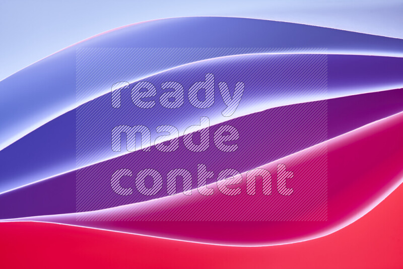 This image showcases an abstract paper art composition with paper curves in different cold and warm gradients created by colored light