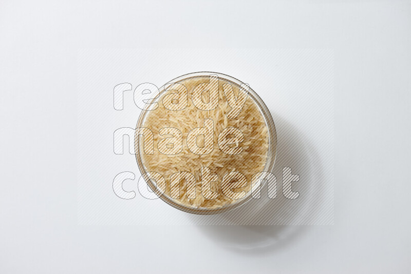 Basmati golden rice on white background