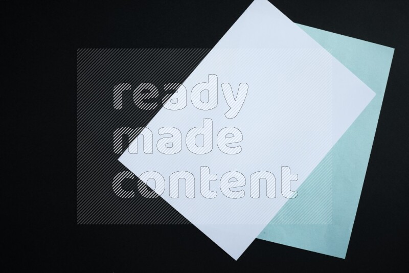 Multicolored paper sheet on black background