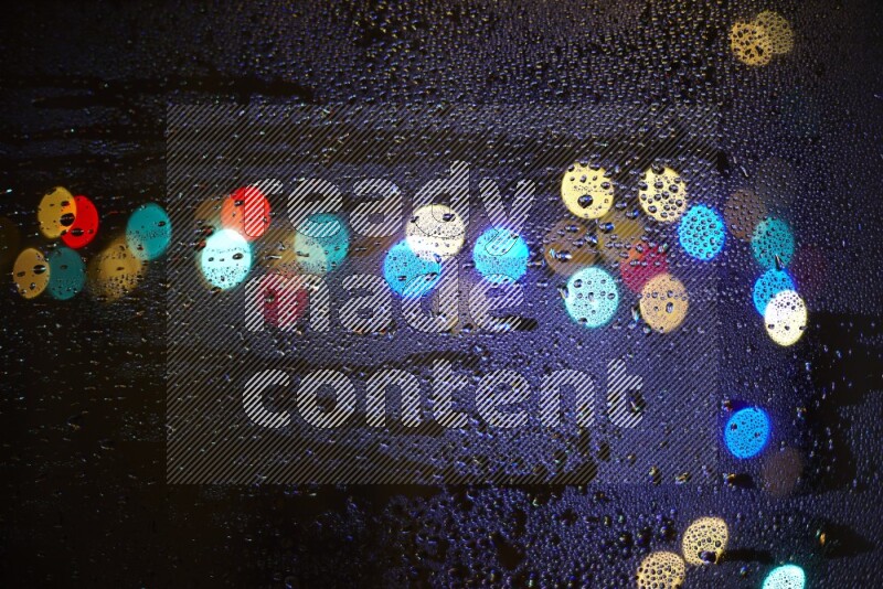 Bokeh light in multicolor with water drops