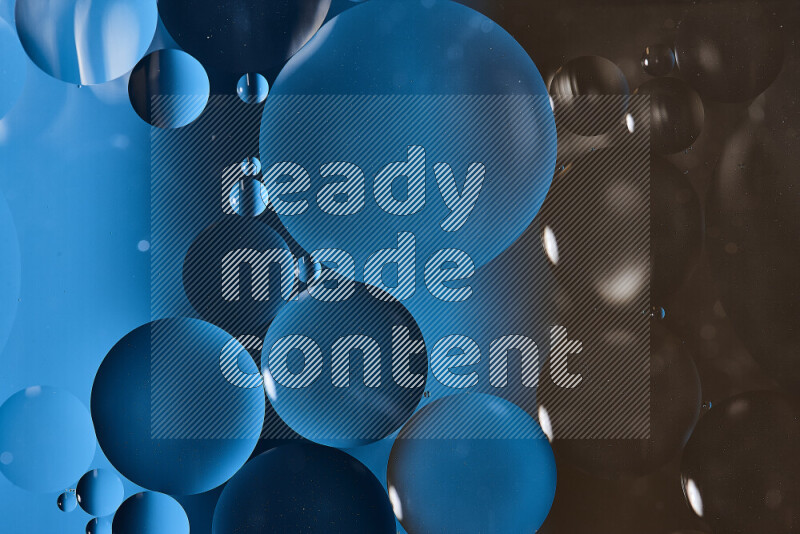 Close-ups of abstract oil bubbles on water surface in shades of blue and brown
