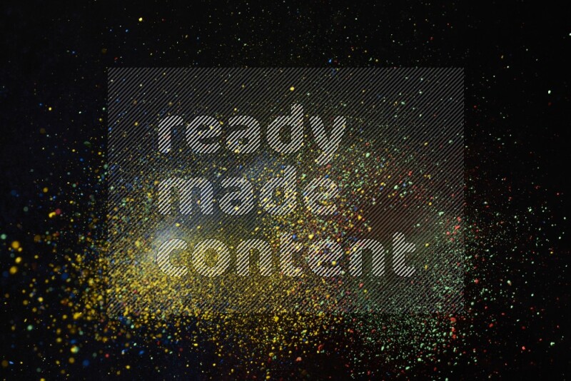 Colorful powder explosion on black background