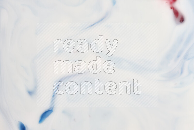 A close-up of abstract swirling patterns in blue, red and white