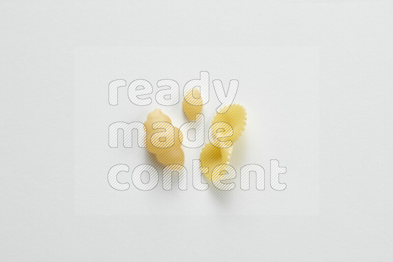Different pasta types on white background