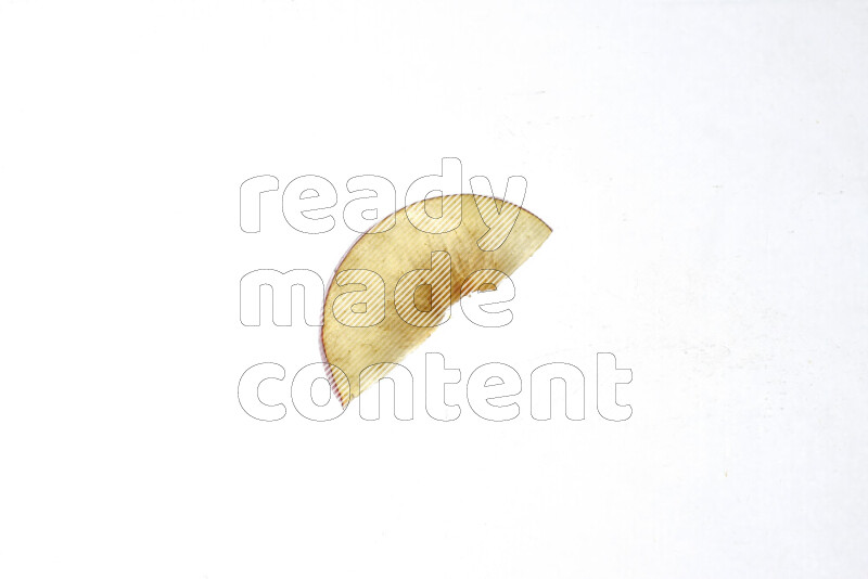 Peach slices on illuminated white background
