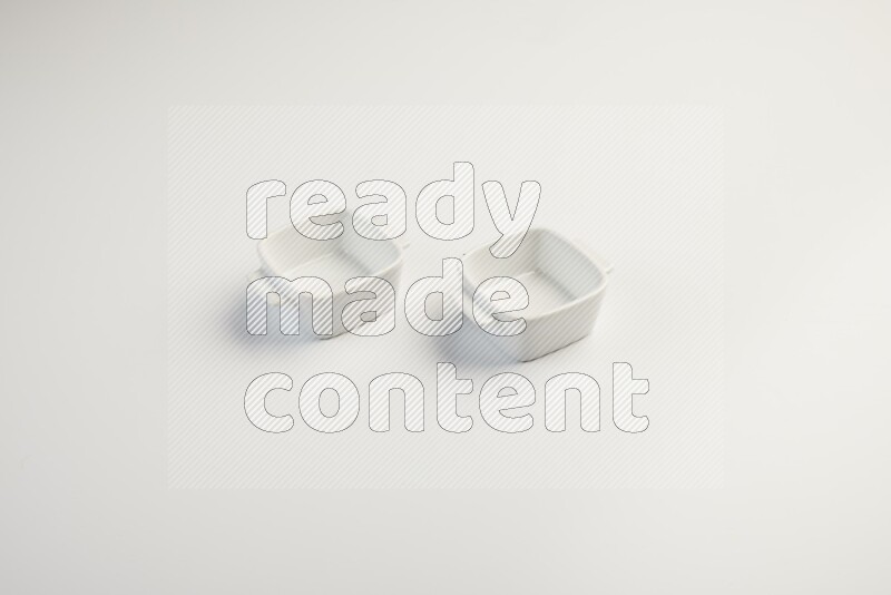 white ceramic square sauce dish on white countertop