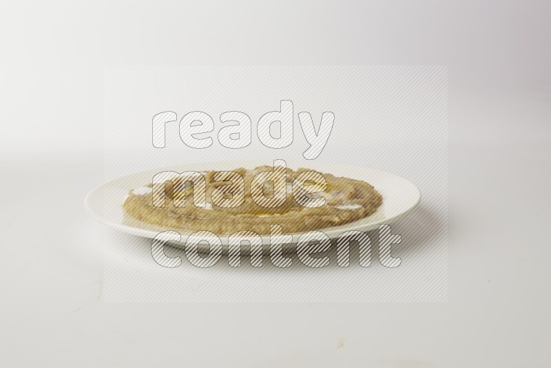 fava bean in a white plate direct on a white background