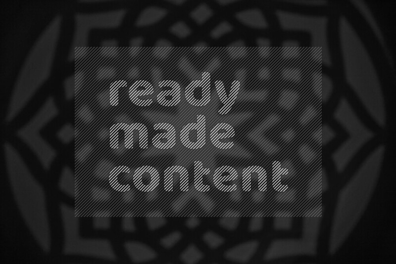 مجموعة من ضوء الغوبو الخافت تظهر أنماط هندسية علي سطح ناعم