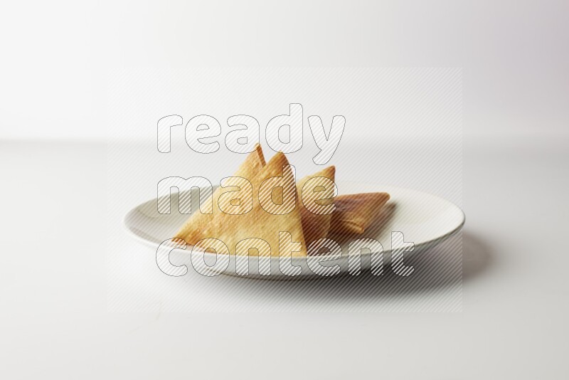 sambosas on a white background