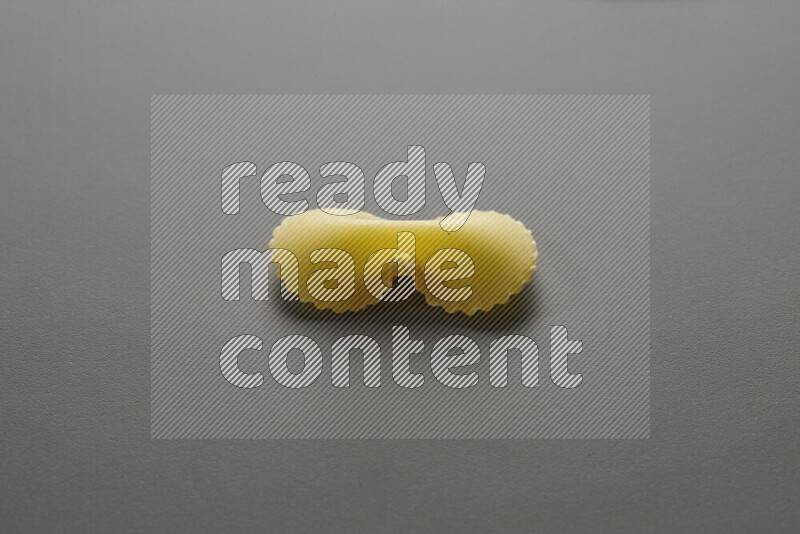 Fiocchi pasta on grey background